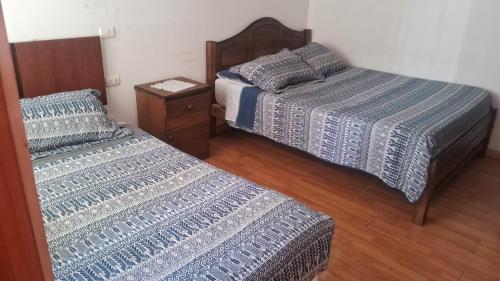 Ένα ή περισσότερα κρεβάτια σε δωμάτιο στο San Lorenzo