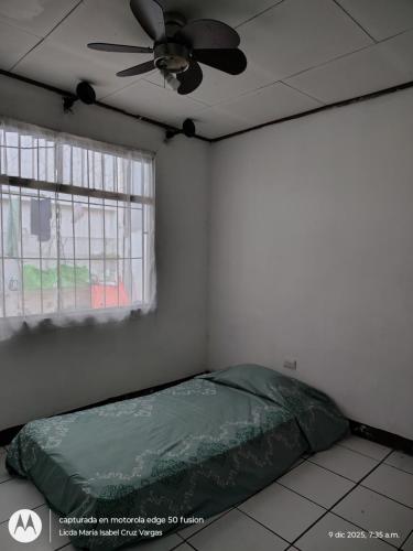 Una cama o camas en una habitación de Lidia's House