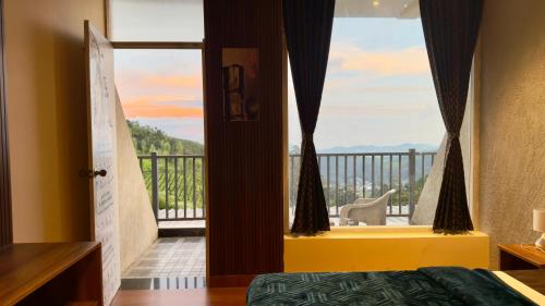 Ένα ή περισσότερα κρεβάτια σε δωμάτιο στο Teyt Grand View