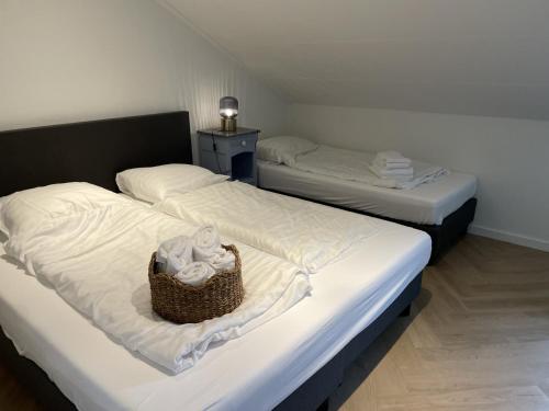 Ένα ή περισσότερα κρεβάτια σε δωμάτιο στο Valley view cottage vlakbij Valkenburg