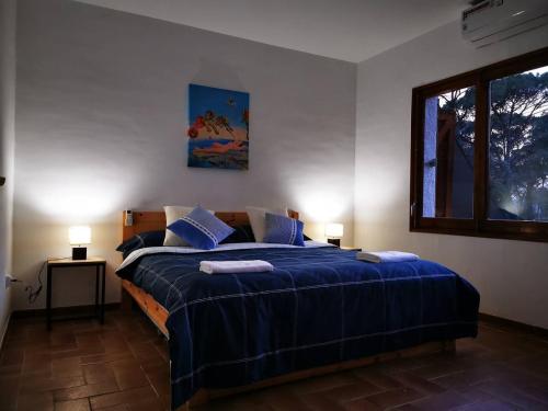 Ένα ή περισσότερα κρεβάτια σε δωμάτιο στο Villa Can Raurell - Girona Costa Brava