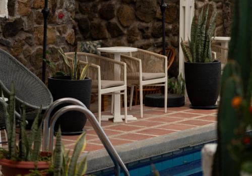 Swimmingpoolen hos eller tæt på Hotel Pimampiro