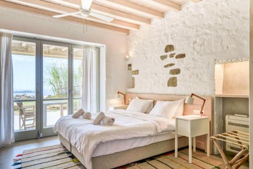 Ένα ή περισσότερα κρεβάτια σε δωμάτιο στο Cloud Blue