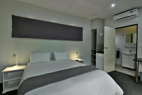 Postel nebo postele na pokoji v ubytování SleepOver Orpen Gate