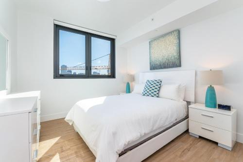 Postel nebo postele na pokoji v ubytování Global Luxury Suites Miami Worldcenter