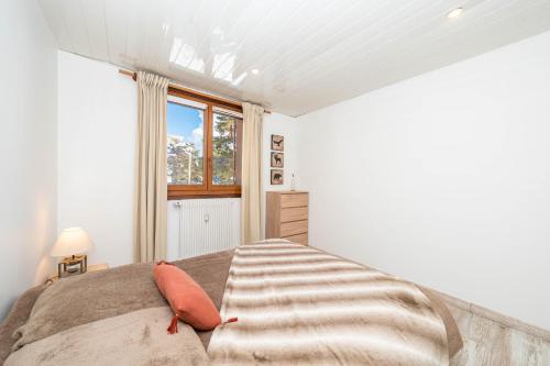 Una cama o camas en una habitación de Panorama des Cimes - T3 avec Sauna privé et Vue imprenable sur la Station