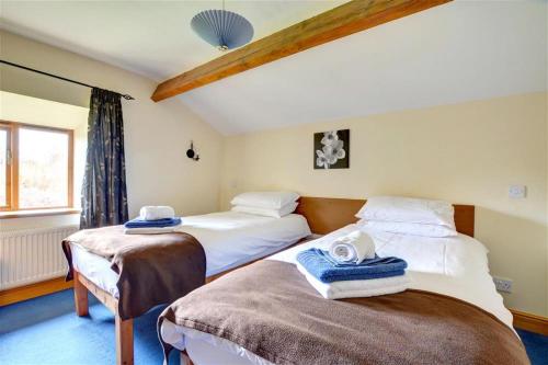 Ένα ή περισσότερα κρεβάτια σε δωμάτιο στο 5 Bed in Tosside Near Settle oc-ds103