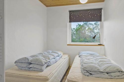Postel nebo postele na pokoji v ubytování 991-Thisted-Liusborg-Sti-23