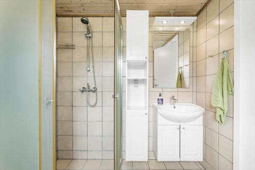 a bathroom with a shower and a sink at 459-Snedsted-Istrupvej-48 in Snedsted