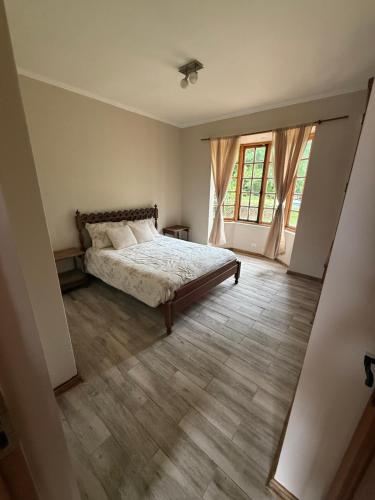 En eller flere senge i et værelse på Countryside retreat getaway