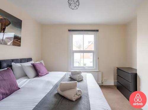 Ένα ή περισσότερα κρεβάτια σε δωμάτιο στο Reading retreat