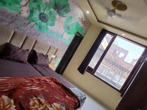 Postel nebo postele na pokoji v ubytování Agam homestay- Few steps walk From Golden Temple