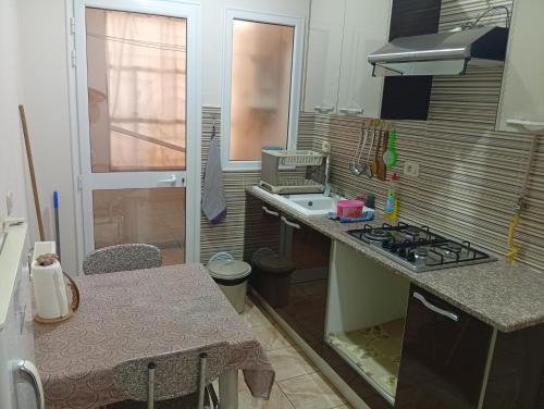 Kuchyň nebo kuchyňský kout v ubytování Lovely Paradise