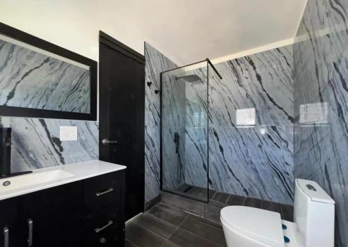 Ένα μπάνιο στο Lane Oceanview Villa - Casita