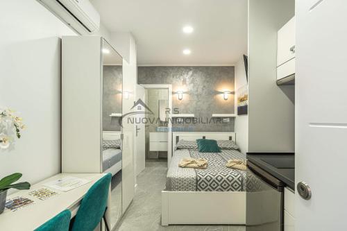 Postel nebo postele na pokoji v ubytování Las Flores studio 1