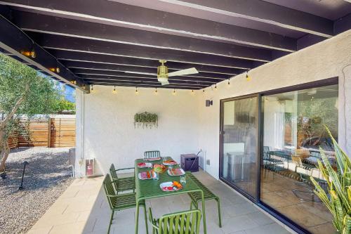 a green table and chairs on a patio at Jewel of the Desert 259-342 in La Quinta
