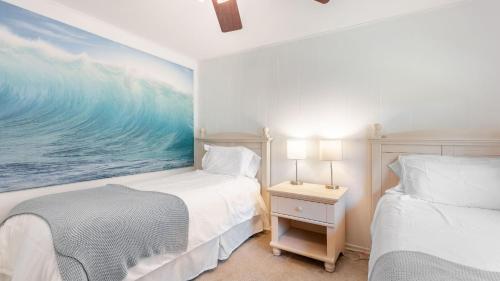 Ένα ή περισσότερα κρεβάτια σε δωμάτιο στο Eagles Watch by AvantStay Large Deck w Views