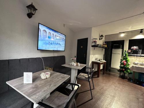 Et tv og/eller underholdning på Heritage Old City Hotel