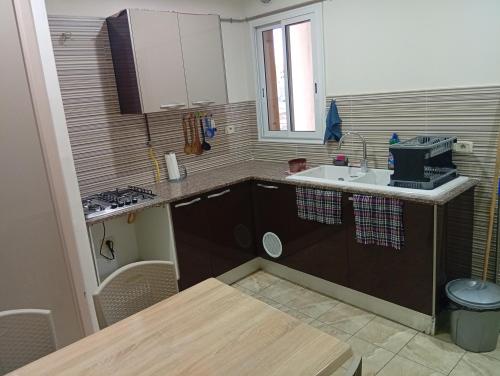 Η κουζίνα ή μικρή κουζίνα στο Paradise Rose