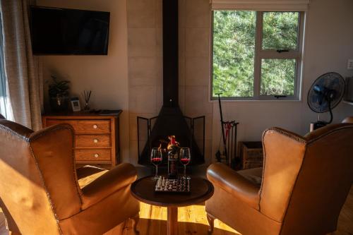 Et opholdsområde på Sunbird Cabin at Vrolikheid Landgoed