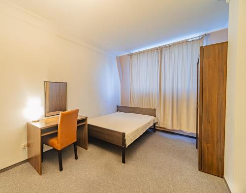 En eller flere senge i et værelse på Apartamenty Wratislavia