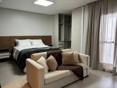 En eller flere senge i et værelse på Flats no Mercure Belém Boulevard