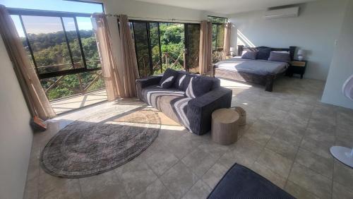 Ένα ή περισσότερα κρεβάτια σε δωμάτιο στο Casa Pura Vista