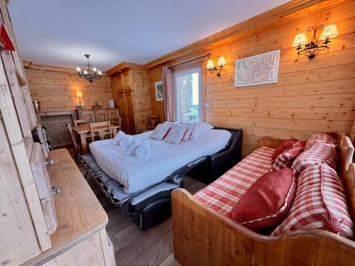 Ένα ή περισσότερα κρεβάτια σε δωμάτιο στο Appart 2 pièces idéal à Tignes, 5 pers, proche pistes et commodités - FR-1-641-101