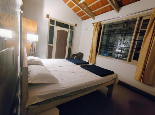 Postel nebo postele na pokoji v ubytování Anava Farms