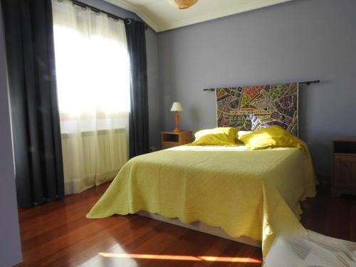 Giường trong phòng chung tại VILLASANA Naturaleza cerca de Bilbao