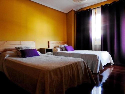 Giường trong phòng chung tại VILLASANA Naturaleza cerca de Bilbao