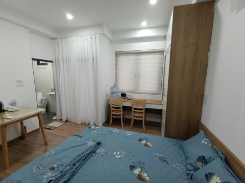 Postel nebo postele na pokoji v ubytování The Full House