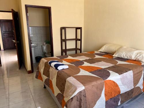 Ένα ή περισσότερα κρεβάτια σε δωμάτιο στο Casa Vásquez