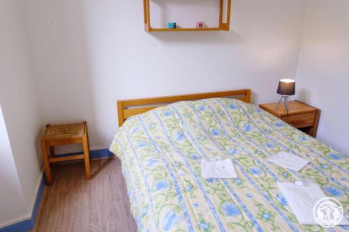 Ένα ή περισσότερα κρεβάτια σε δωμάτιο στο Gite