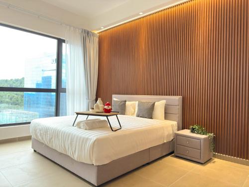 En eller flere senge i et værelse på Mossaz By Synergy Property Management