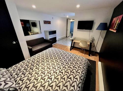 Postel nebo postele na pokoji v ubytování Charmant petit studio à 15 minutes de Montréal