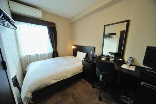 Katil atau katil-katil dalam bilik di Dormy Inn Express Koriyama