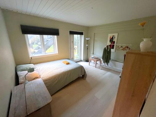 Ένα ή περισσότερα κρεβάτια σε δωμάτιο στο 1 Private Room in a Shared House with Garden Access