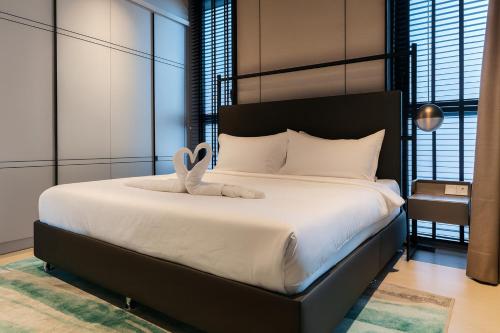 Postel nebo postele na pokoji v ubytování Antara Genting Highland premium Suite by ImooHome