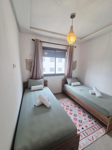 Ένα ή περισσότερα κρεβάτια σε δωμάτιο στο Glorious appartement cosy