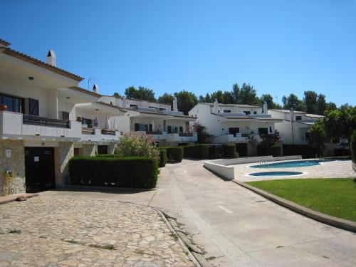 Maison familiale avec jardin et terrasse privée, piscine commune, proche de L'Estartit