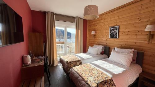 Postel nebo postele na pokoji v ubytování By La Réserve