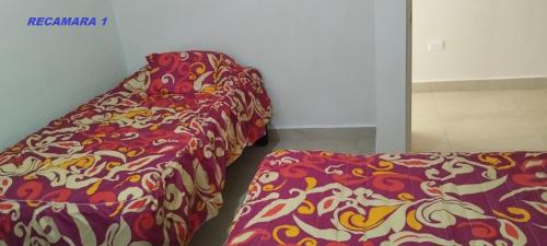 Postel nebo postele na pokoji v ubytování Casa Mar Miramar