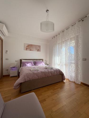 Una cama o camas en una habitación de La Casetta del Glicine