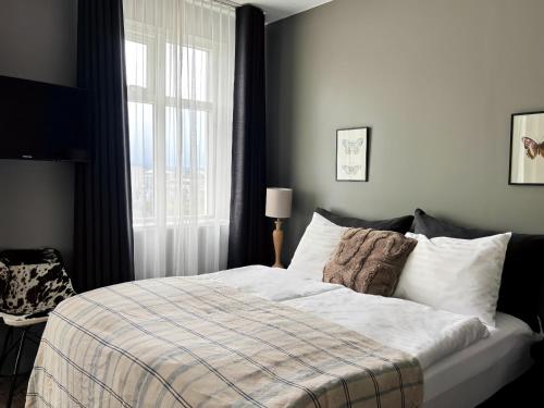 Postel nebo postele na pokoji v ubytování Hotel Leifur Eiriksson
