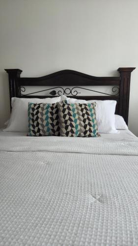 Postel nebo postele na pokoji v ubytování Aparthotel zona 9