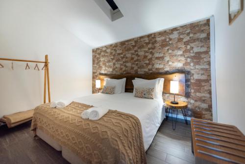 Ένα ή περισσότερα κρεβάτια σε δωμάτιο στο Quinta do Limite - Casa do Camponês