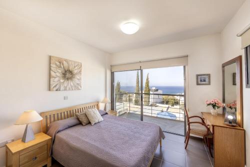 Postel nebo postele na pokoji v ubytování Lenias Sea View