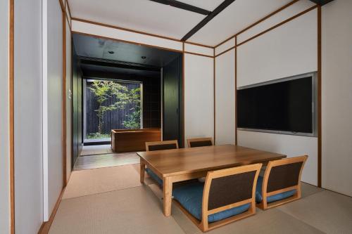 TV a/nebo společenská místnost v ubytování Kikuyu No Yado