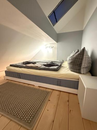 Ένα ή περισσότερα κρεβάτια σε δωμάτιο στο Strandoase